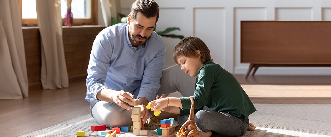 Dad and son playing