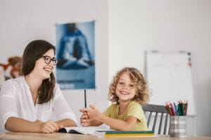 Girl and woman studying