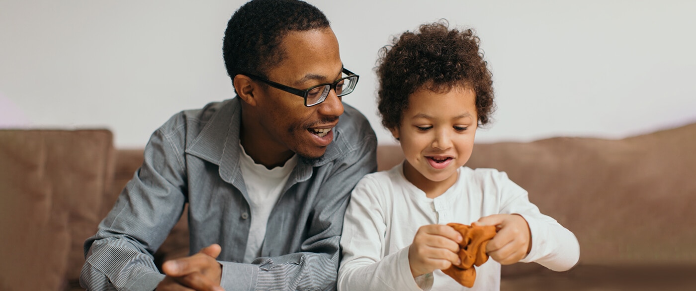 Man and Child Playing